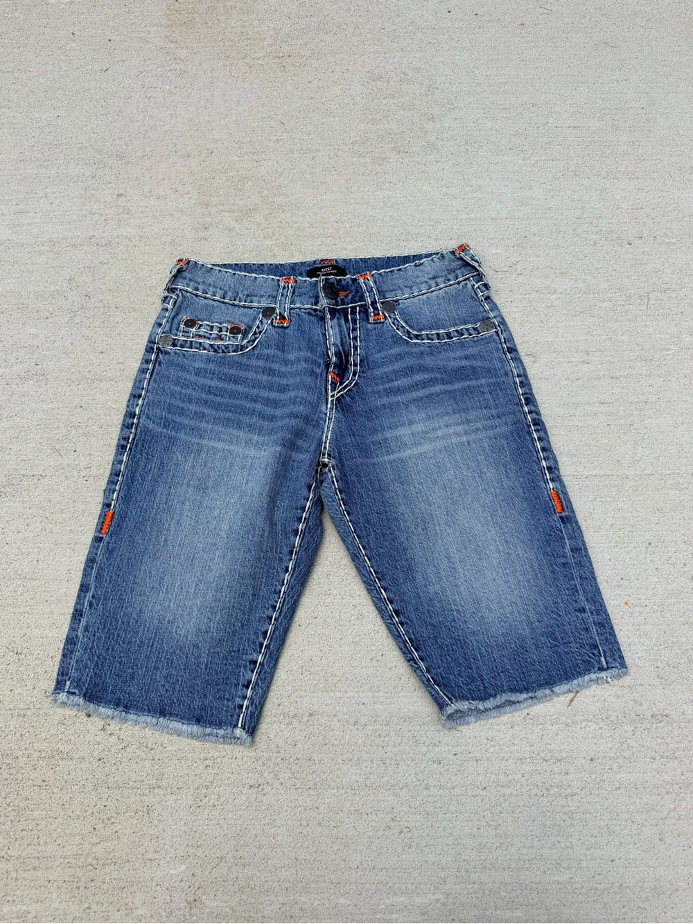 Denim Cutoff Bermuda Shorts in Medium Blue